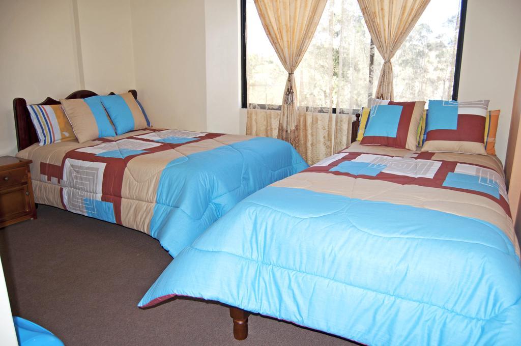 Hotel Residencial El Viajero Tababela Room photo